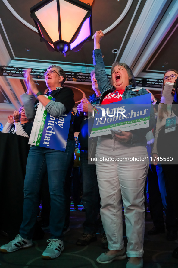 Attendees cheer while Minnesota Lieutenant Governor Peggy Flanagan speaks at the Minnesota DFL Election Night event at the InterContinental...