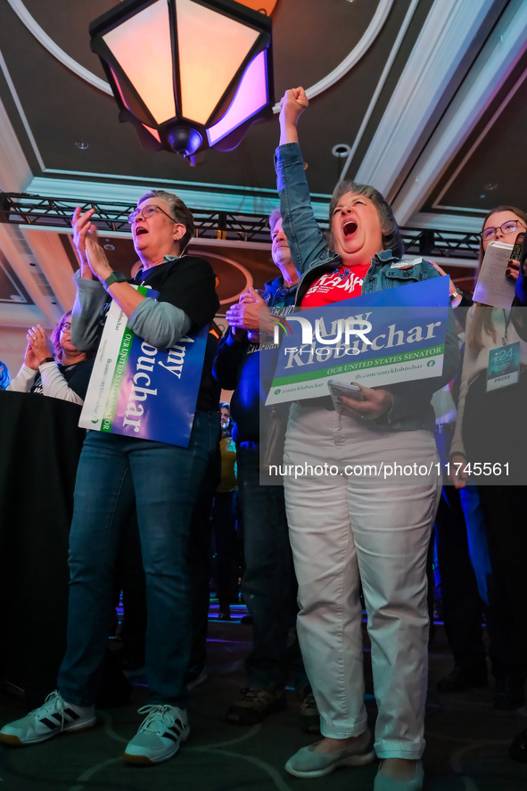 Attendees cheer while Minnesota Lieutenant Governor Peggy Flanagan speaks at the Minnesota DFL Election Night event at the InterContinental...