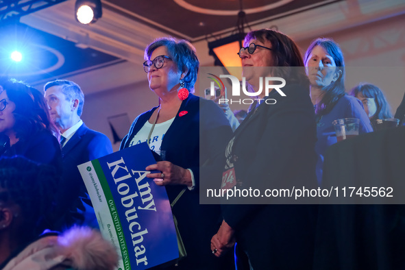 Attendees look on while Minnesota Lieutenant Governor Peggy Flanagan speaks at the Minnesota DFL Election Night event at the InterContinenta...