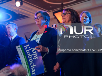 Attendees look on while Minnesota Lieutenant Governor Peggy Flanagan speaks at the Minnesota DFL Election Night event at the InterContinenta...