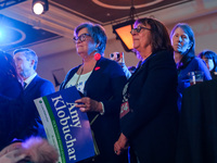 Attendees look on while Minnesota Lieutenant Governor Peggy Flanagan speaks at the Minnesota DFL Election Night event at the InterContinenta...