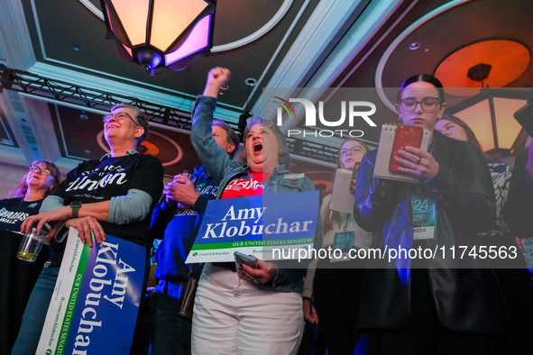 Attendees cheer while Minnesota Lieutenant Governor Peggy Flanagan speaks at the Minnesota DFL Election Night event at the InterContinental...