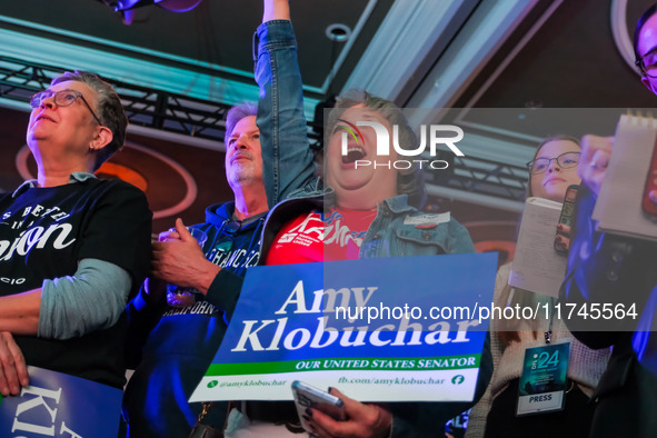 Attendees cheer while Minnesota Lieutenant Governor Peggy Flanagan speaks at the Minnesota DFL Election Night event at the InterContinental...