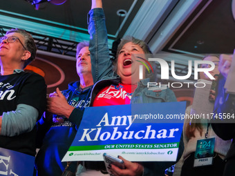 Attendees cheer while Minnesota Lieutenant Governor Peggy Flanagan speaks at the Minnesota DFL Election Night event at the InterContinental...