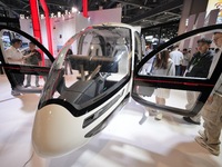 Visitors experience the VE25 Quanzhen 1:1 cabin of Volante Air at the 7th CIIE in Shanghai, China, on November 6, 2024. The Expo opens a spe...