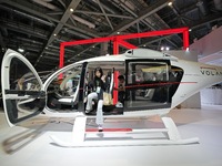 Visitors experience the VE25 Quanzhen 1:1 cabin of Volante Air at the 7th CIIE in Shanghai, China, on November 6, 2024. The Expo opens a spe...