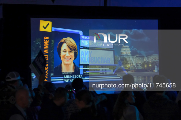 A TV screen shows the victory of United States Senator Amy Klobuchar at the Minnesota DFL Election Night event at the InterContinental Hotel...