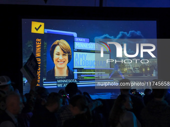 A TV screen shows the victory of United States Senator Amy Klobuchar at the Minnesota DFL Election Night event at the InterContinental Hotel...