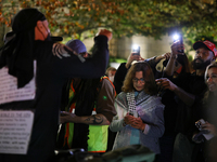 Opposing political demonstrators gather near the White House in Washington, D.C. on November 5, 2024. (