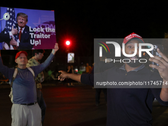 Opposing political demonstrators gather near the White House in Washington, D.C. on November 5, 2024. (