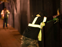 Workers erect a security fence near the White House in Washington, D.C. on November 5, 2024 as results are tallied for the presidential elec...