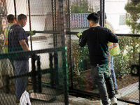 Workers erect a security fence near the White House in Washington, D.C. on November 5, 2024 as results are tallied for the presidential elec...