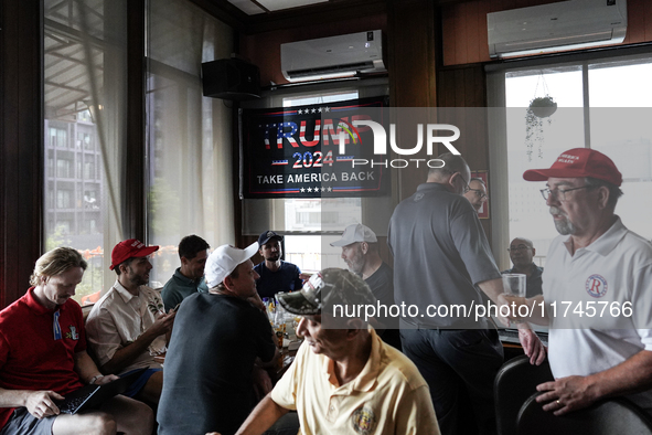 Republican Party supporters gather at a roadhouse restaurant to view U.S. media coverage of the U.S. presidential election in Bangkok, Thail...