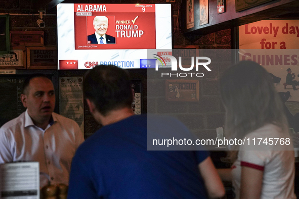 Democrat Party supporters gather at a roadhouse restaurant to view U.S. media coverage of the U.S. presidential election in Bangkok, Thailan...