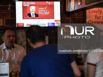 Democrat Party supporters gather at a roadhouse restaurant to view U.S. media coverage of the U.S. presidential election in Bangkok, Thailan...