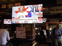 Democrat Party supporters gather at a roadhouse restaurant to view U.S. media coverage of the U.S. presidential election in Bangkok, Thailan...