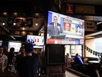 Democrat Party supporters gather at a roadhouse restaurant to view U.S. media coverage of the U.S. presidential election in Bangkok, Thailan...