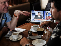 Republican Party supporters gather at a roadhouse restaurant to view U.S. media coverage of the U.S. presidential election in Bangkok, Thail...