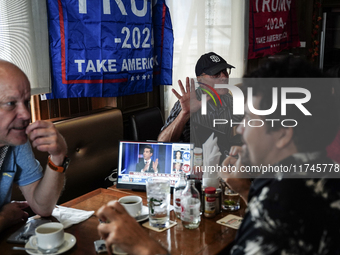 Republican Party supporters gather at a roadhouse restaurant to view U.S. media coverage of the U.S. presidential election in Bangkok, Thail...