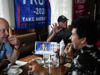 Republican Party supporters gather at a roadhouse restaurant to view U.S. media coverage of the U.S. presidential election in Bangkok, Thail...