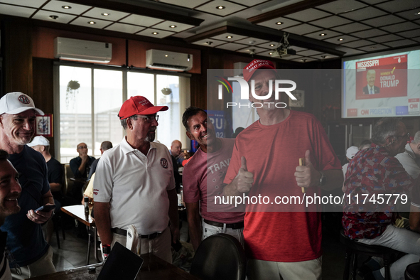 Republican Party supporters gather at a roadhouse restaurant to view U.S. media coverage of the U.S. presidential election in Bangkok, Thail...