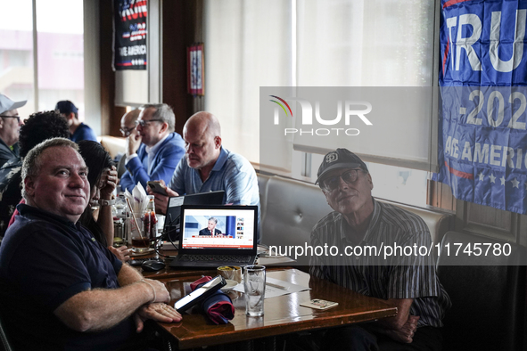 Republican Party supporters gather at a roadhouse restaurant to view U.S. media coverage of the U.S. presidential election in Bangkok, Thail...