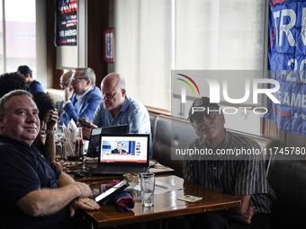 Republican Party supporters gather at a roadhouse restaurant to view U.S. media coverage of the U.S. presidential election in Bangkok, Thail...