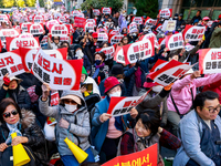 Hundreds of party members and supporters hold a protest demanding the resignation of leader Han Dong-hoon, alleging he takes an independent...