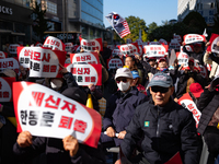 Hundreds of party members and supporters hold a protest demanding the resignation of leader Han Dong-hoon, alleging he takes an independent...