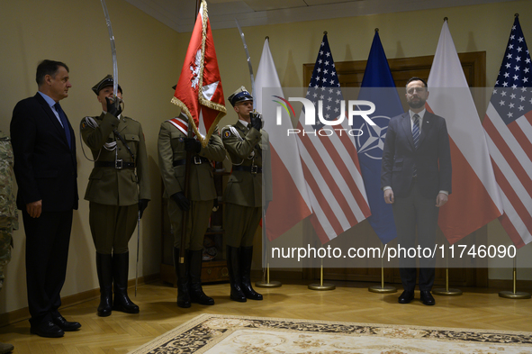 Poland's Deputy Prime Minister and Defence Minister, Wladyslaw Kosiniak-Kamysz, awards U.S. soldiers stationed in Poland for their service i...