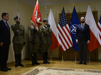 Poland's Deputy Prime Minister and Defence Minister, Wladyslaw Kosiniak-Kamysz, awards U.S. soldiers stationed in Poland for their service i...