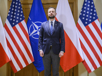 Poland's Deputy Prime Minister and Defence Minister, Wladyslaw Kosiniak-Kamysz, awards U.S. soldiers stationed in Poland for their service i...