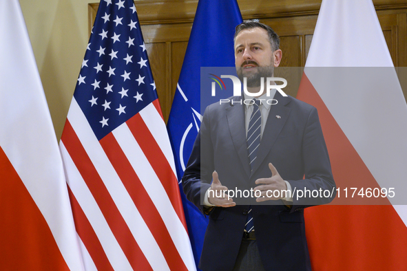 Poland's Deputy Prime Minister and Defence Minister, Wladyslaw Kosiniak-Kamysz, awards U.S. soldiers stationed in Poland for their service i...