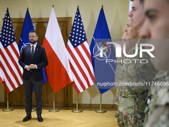 Poland's Deputy Prime Minister and Defence Minister, Wladyslaw Kosiniak-Kamysz, awards U.S. soldiers stationed in Poland for their service i...