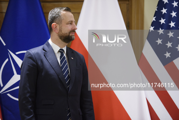 Poland's Deputy Prime Minister and Defence Minister, Wladyslaw Kosiniak-Kamysz, awards U.S. soldiers stationed in Poland for their service i...