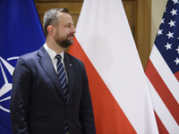 Poland's Deputy Prime Minister and Defence Minister, Wladyslaw Kosiniak-Kamysz, awards U.S. soldiers stationed in Poland for their service i...