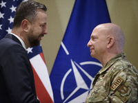 Poland's Deputy Prime Minister and Defence Minister, Wladyslaw Kosiniak-Kamysz, awards U.S. soldiers stationed in Poland for their service i...