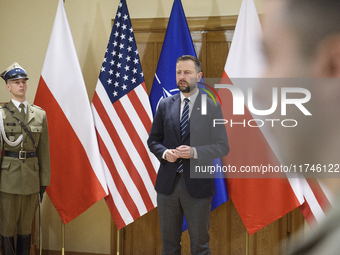 Poland's Deputy Prime Minister and Defence Minister, Wladyslaw Kosiniak-Kamysz, speaks after awarding U.S. soldiers stationed in Poland for...