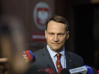 Polish Minister of Foreign Affairs Radoslaw Sikorski holds a press conference outside the Ministry of Foreign Affairs building in Warsaw, Po...