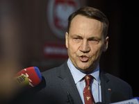 Polish Minister of Foreign Affairs Radoslaw Sikorski holds a press conference outside the Ministry of Foreign Affairs building in Warsaw, Po...