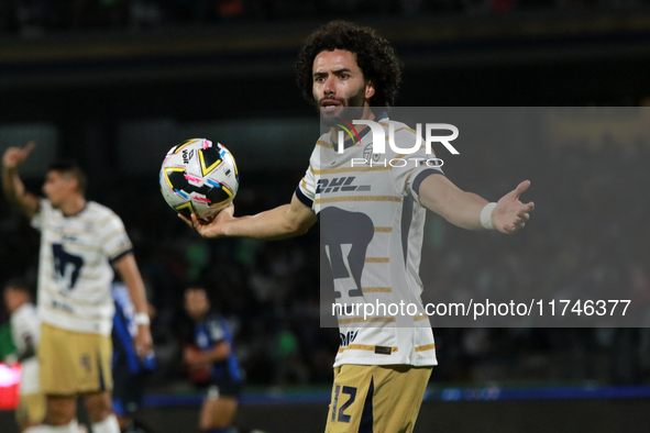 Cesar Huerta #12 of the Pumas de la UNAM claims during the match corresponding to round 16 of the Apertura 2024 tournament of the Liga BBVA...