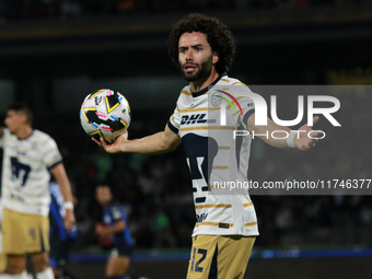 Cesar Huerta #12 of the Pumas de la UNAM claims during the match corresponding to round 16 of the Apertura 2024 tournament of the Liga BBVA...