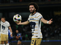 Cesar Huerta #12 of the Pumas de la UNAM claims during the match corresponding to round 16 of the Apertura 2024 tournament of the Liga BBVA...