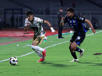 Jorge Ruvalcaba #17 of Pumas de la UNAM and Alan Medina #11 of Queretaro fight for the ball during the match corresponding to round 16 of th...