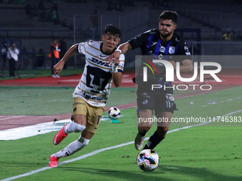 Jorge Ruvalcaba #17 of Pumas de la UNAM and Alan Medina #11 of Queretaro fight for the ball during the match corresponding to round 16 of th...