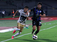 Jorge Ruvalcaba #17 of Pumas de la UNAM and Alan Medina #11 of Queretaro fight for the ball during the match corresponding to round 16 of th...