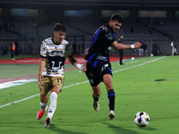 Jorge Ruvalcaba #17 of Pumas de la UNAM and Alan Medina #11 of Queretaro fight for the ball during the match corresponding to round 16 of th...