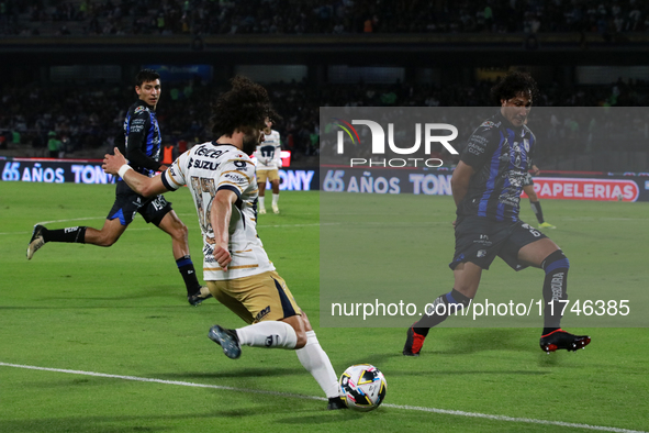 Cesar Huerta #12 of Pumas de la UNAM and Jose Canale #6 of Queretaro fight for the ball during the match corresponding to round 16 of the Ap...