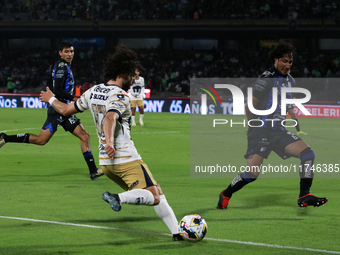 Cesar Huerta #12 of Pumas de la UNAM and Jose Canale #6 of Queretaro fight for the ball during the match corresponding to round 16 of the Ap...