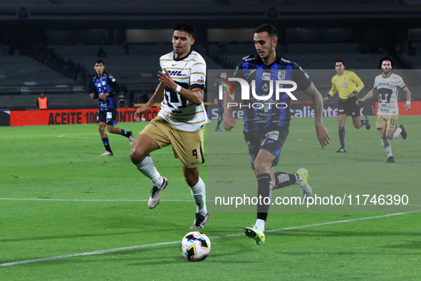 Guillermo Martinez #9 of Pumas de la UNAM and Franco Russo #4 of Queretaro fight for the ball during the match corresponding to round 16 of...